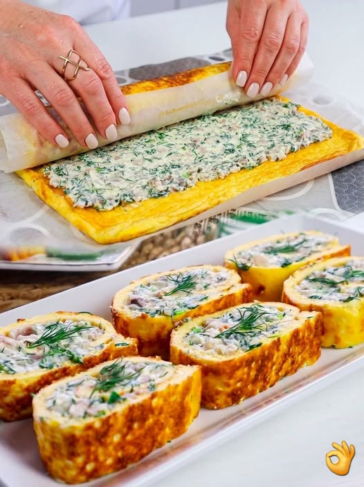 Кулинария>Рулет яичный с селедкой – невероятно вкусная закуска!